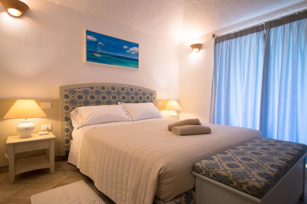 Postel nebo postele na pokoji v ubytování Hotel Nibaru