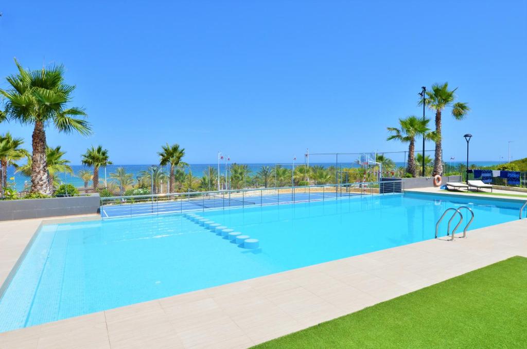 The swimming pool at or close to Beachfront Luxury Apartments