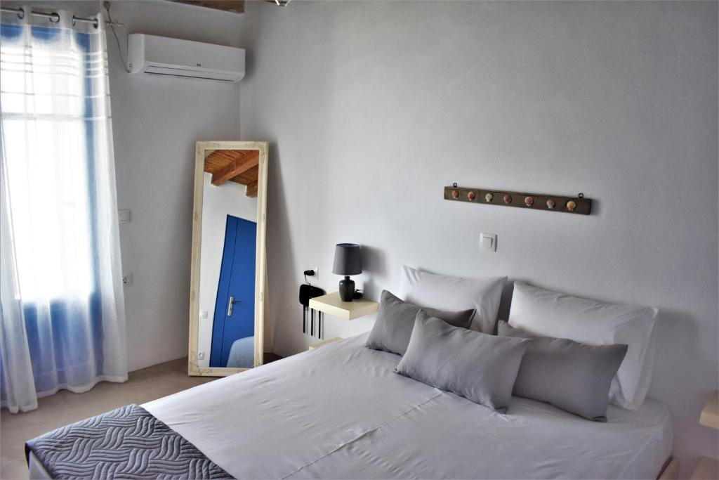 Postel nebo postele na pokoji v ubytování Arsinoi Apartments