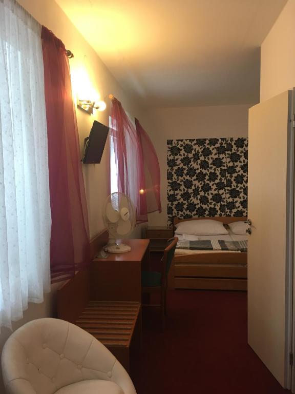 Postel nebo postele na pokoji v ubytování Pension Miltom