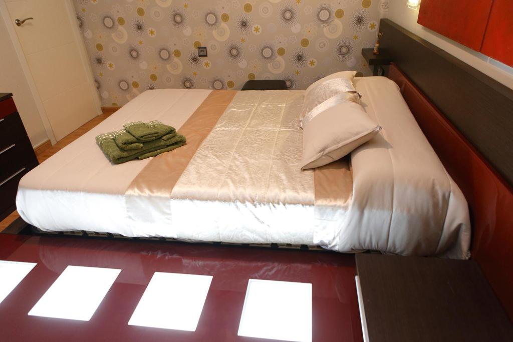 Posteľ alebo postele v izbe v ubytovaní The Victoria Apartament in Hellín
