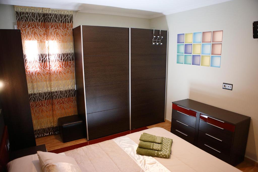 Posteľ alebo postele v izbe v ubytovaní The Victoria Apartament in Hellín
