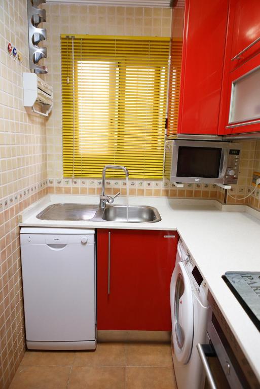 Kuchyňa alebo kuchynka v ubytovaní The Victoria Apartament in Hellín