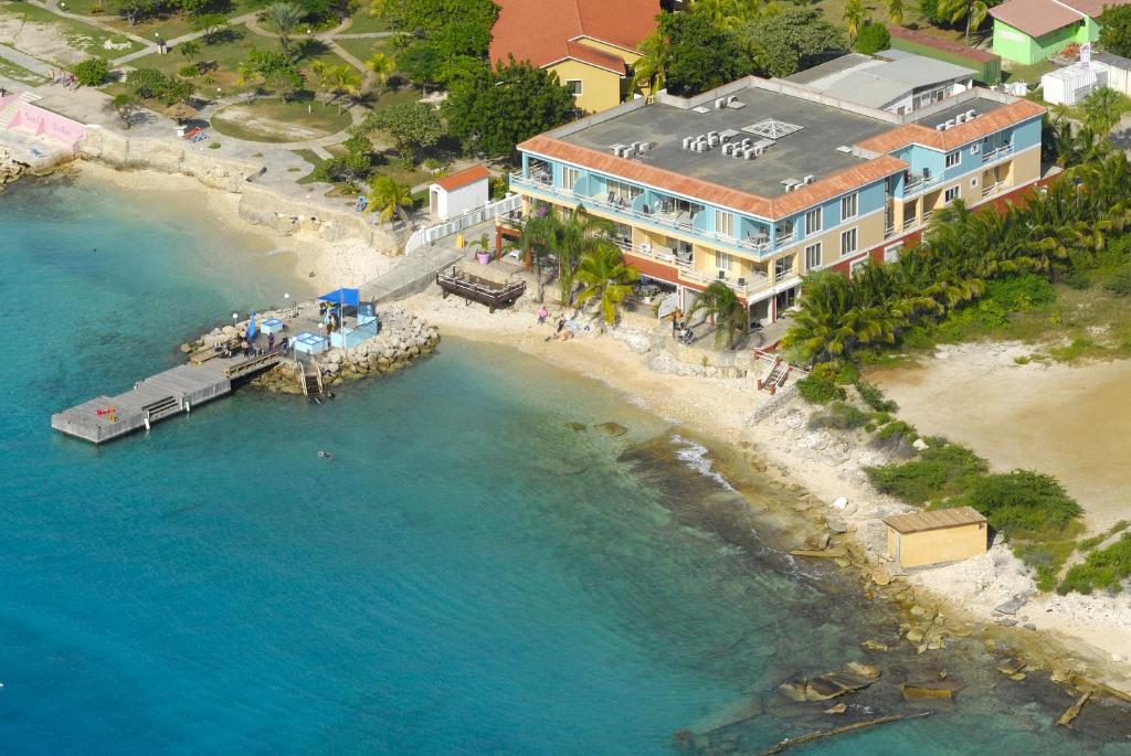 an aerial view of a resort on a beach at Luxury Studio Needlefish at Den Laman in Kralendijk