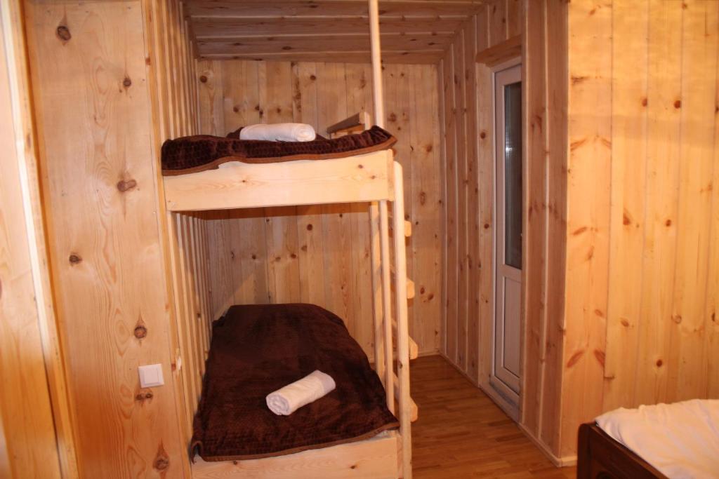 Postel nebo postele na pokoji v ubytování Ecohouse Svaneti