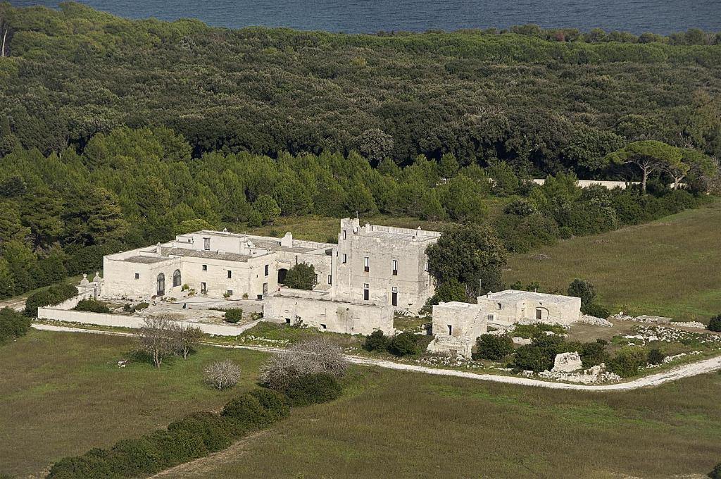 an aerial view of a large house in a field at Masseria Specchiulla in Otranto