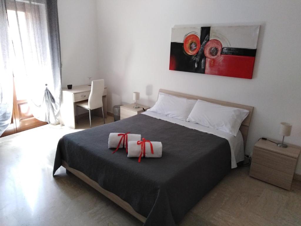 Letto o letti in una camera di Affittacamere Casa Quisquina