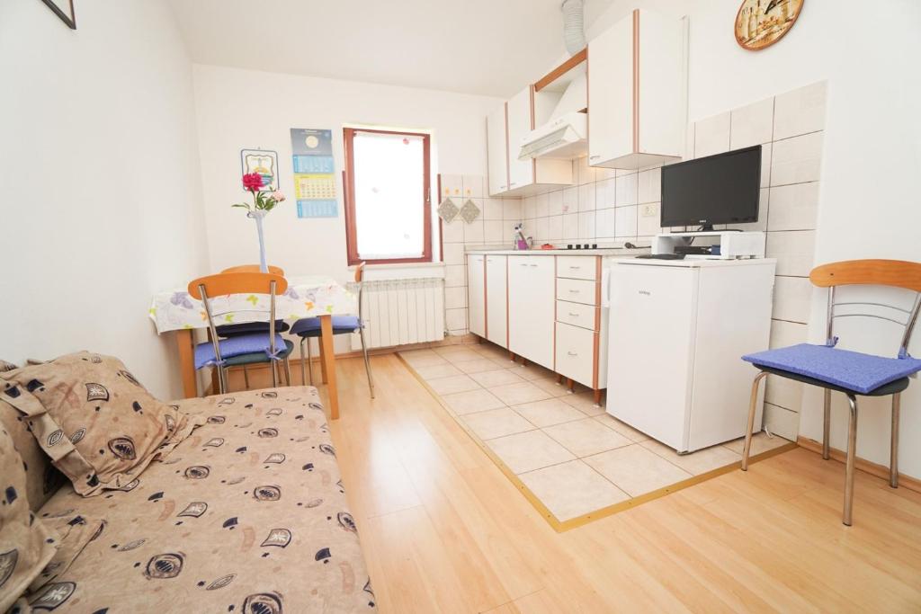 Kuchyň nebo kuchyňský kout v ubytování Apartment Sandra