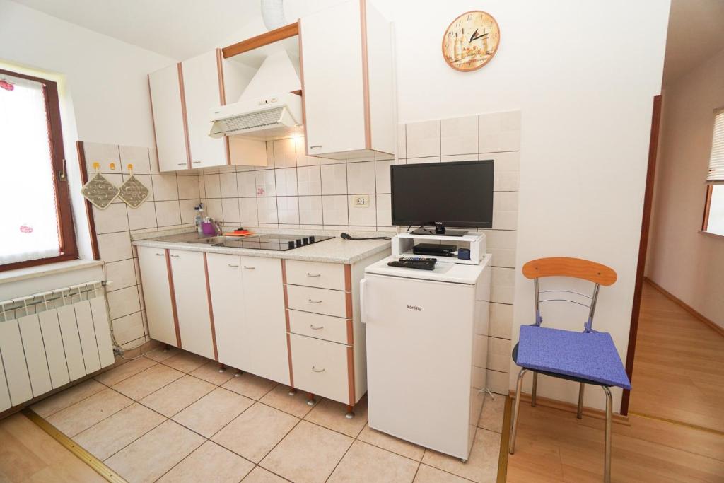Kuchyň nebo kuchyňský kout v ubytování Apartment Sandra
