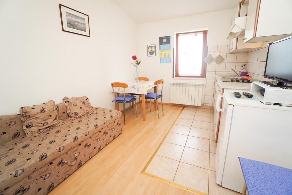 Kuchyň nebo kuchyňský kout v ubytování Apartment Sandra
