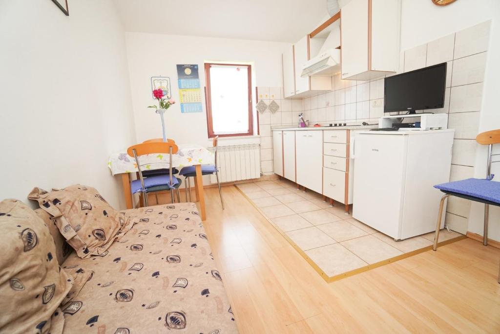 Kuchyň nebo kuchyňský kout v ubytování Apartment Sandra