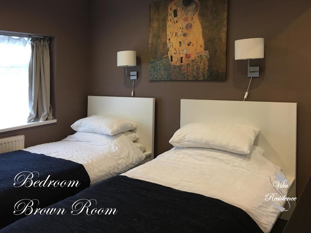 Tempat tidur dalam kamar di Vika Residence Deluxe Apartments Wednesbury Holiday Resort