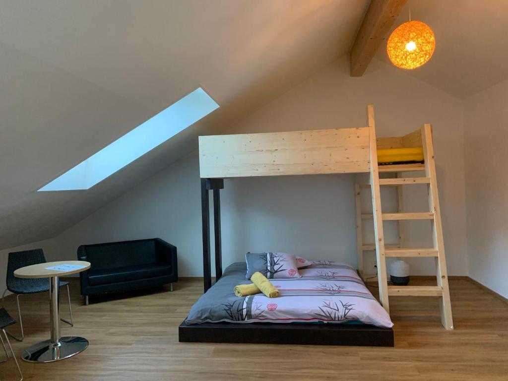 A bed or beds in a room at Pardo Bar