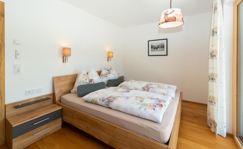 Posteľ alebo postele v izbe v ubytovaní Ferienwohnung App. MOUNTAIN VIEW