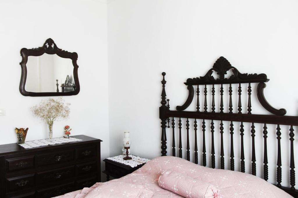 Кровать или кровати в номере Casa do Neto Tiago