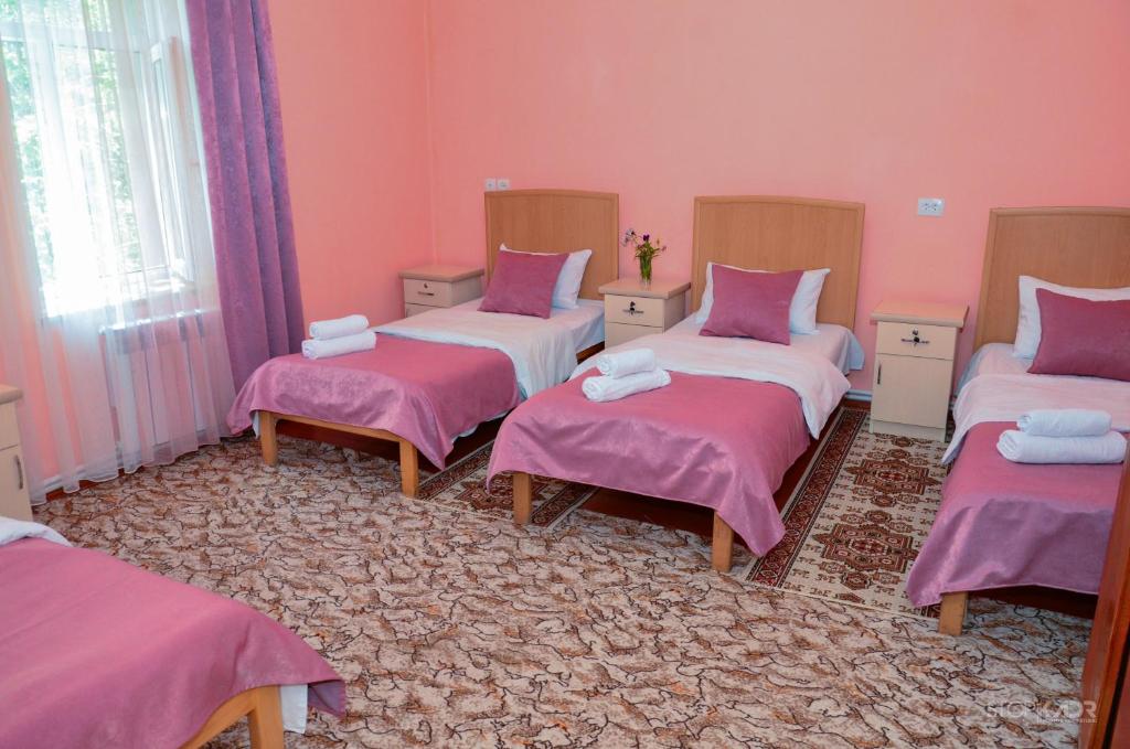 Postel nebo postele na pokoji v ubytování Narek B&B