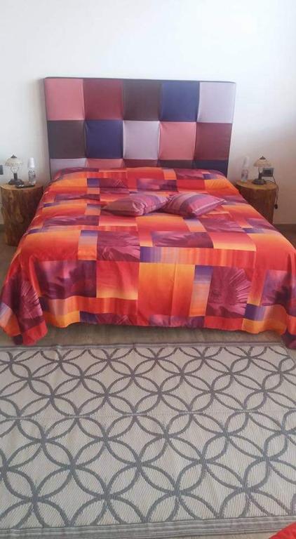 Postel nebo postele na pokoji v ubytování Agriturismo Alveare sul lago