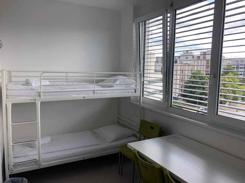 Postel nebo postele na pokoji v ubytování Hostel Villa Domus