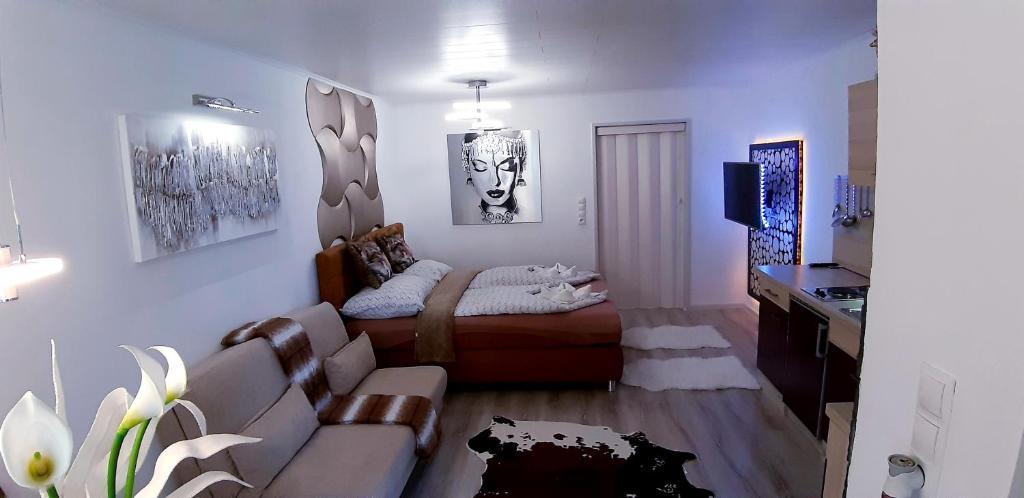 Posteľ alebo postele v izbe v ubytovaní EMERALD APARTMENT