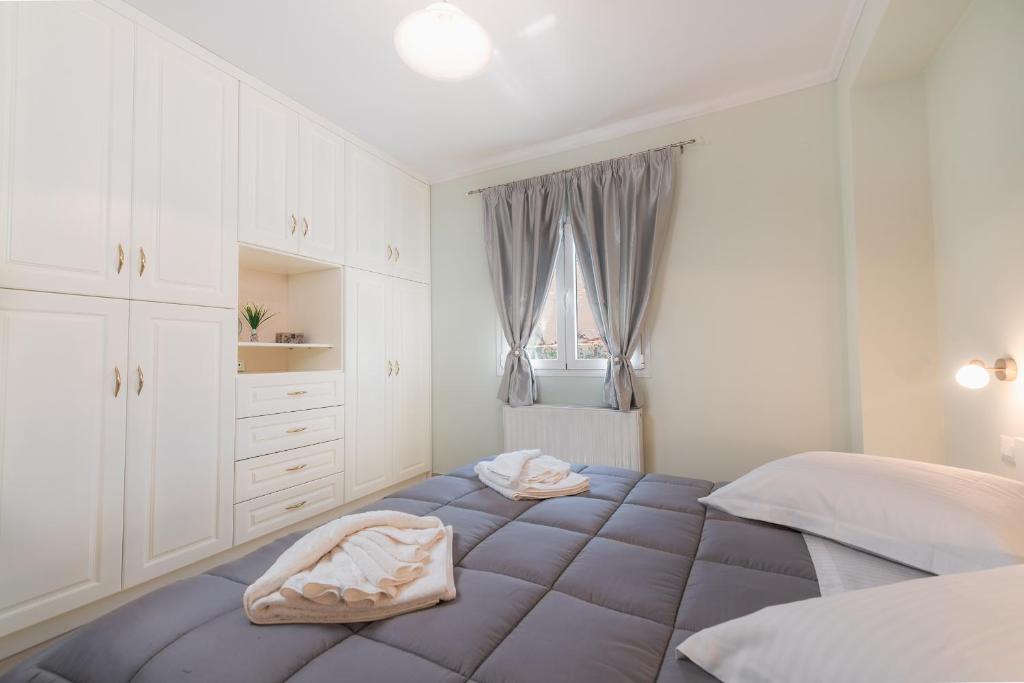 Posteľ alebo postele v izbe v ubytovaní Corfu Villa Potamaki