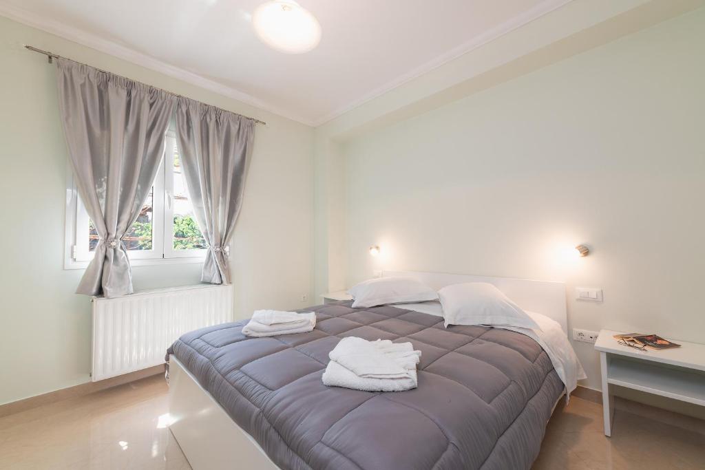 Posteľ alebo postele v izbe v ubytovaní Corfu Villa Potamaki