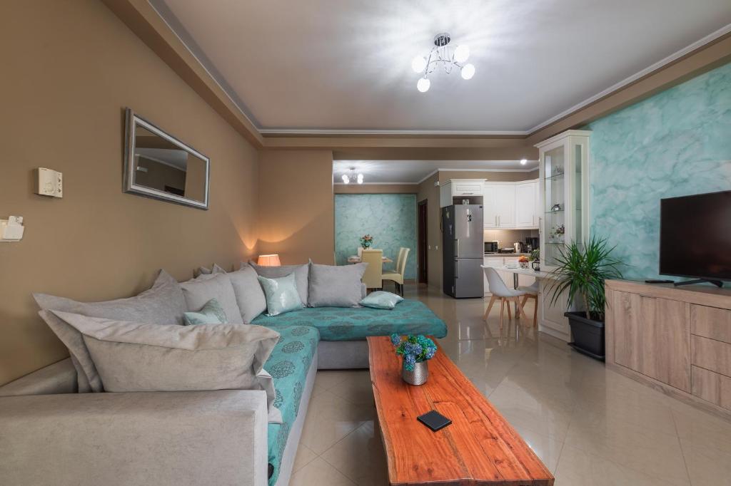 Televízia a/alebo spoločenská miestnosť v ubytovaní Corfu Villa Potamaki