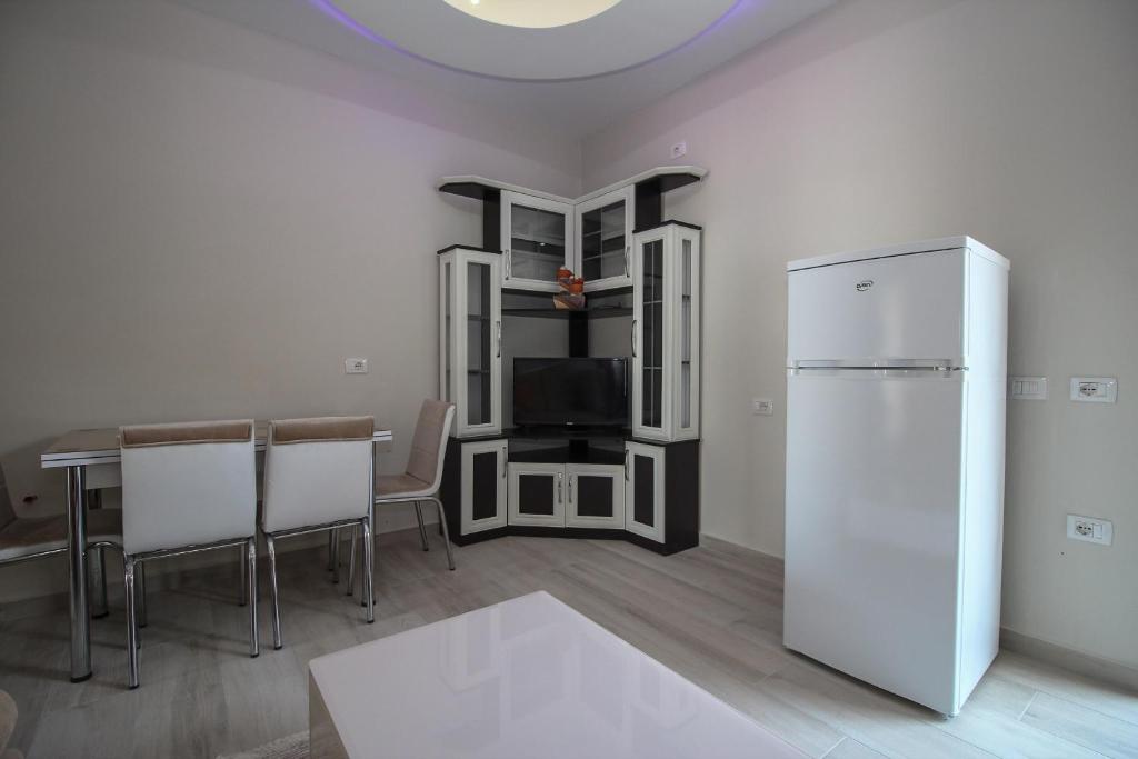 Kuchyň nebo kuchyňský kout v ubytování Apartments Romario