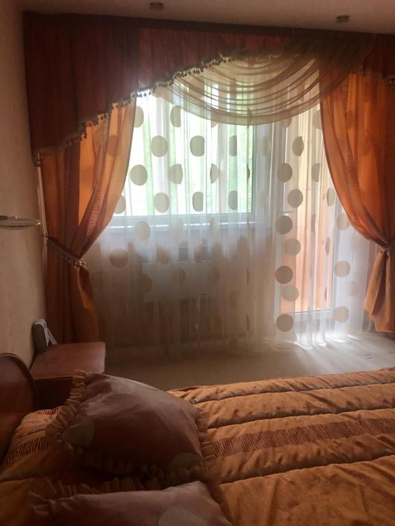 Postel nebo postele na pokoji v ubytování Apartments Kohtla-Jarve
