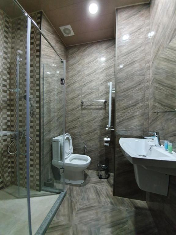Koupelna v ubytování Hotel Soft
