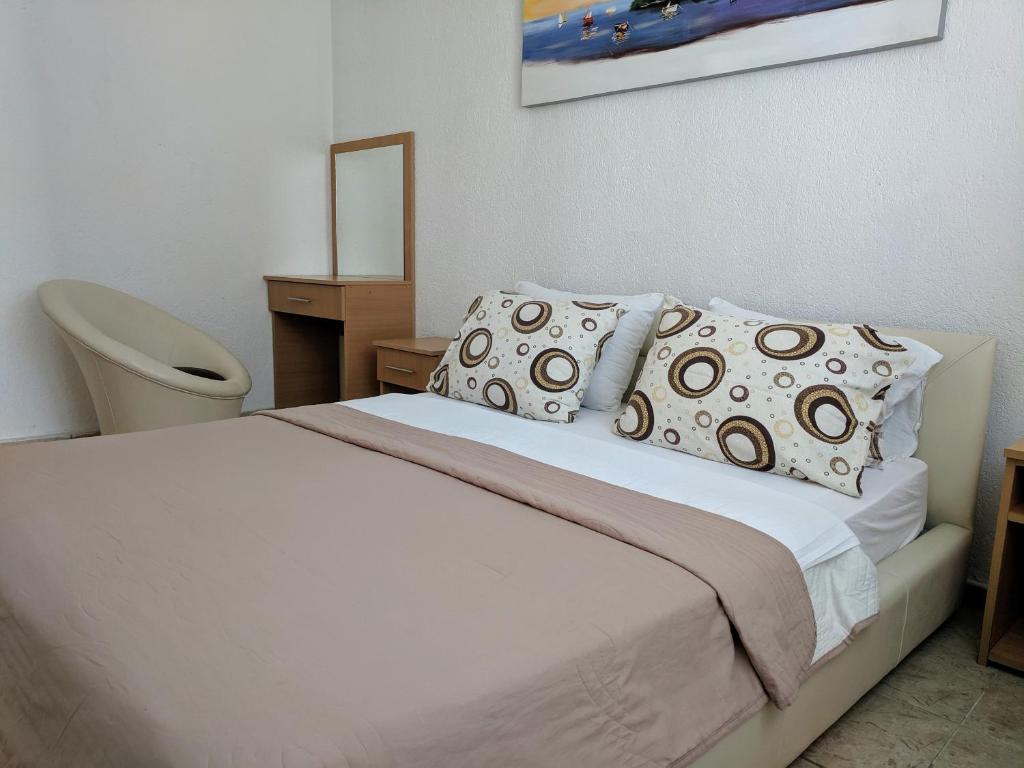Postel nebo postele na pokoji v ubytování Beni Bungalows