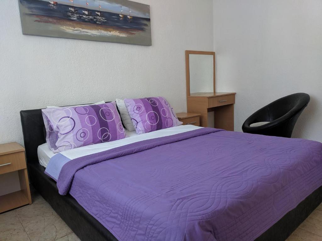 Postel nebo postele na pokoji v ubytování Beni Bungalows
