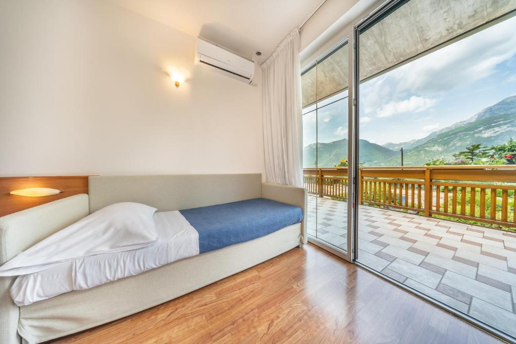 Postel nebo postele na pokoji v ubytování Hotel Karinhall