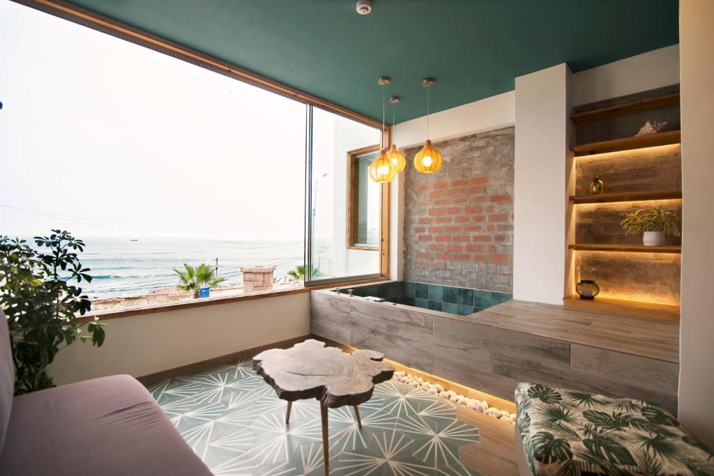 Posezení v ubytování Kauhuhu Casa Hotel