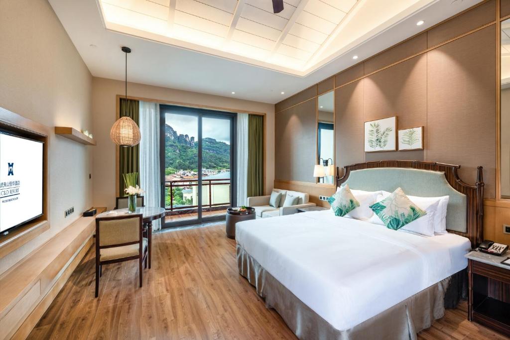 Postel nebo postele na pokoji v ubytování C&D Resort,Wuyi Mountain