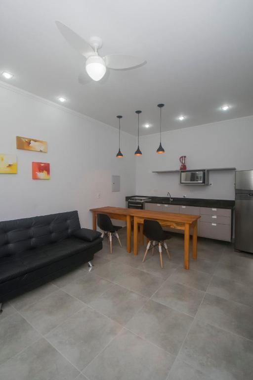 Kuchyň nebo kuchyňský kout v ubytování Flat com serviços na Riviera