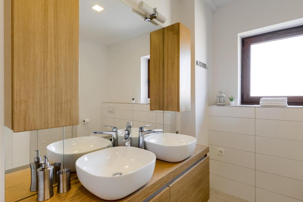 Kúpeľňa v ubytovaní Apartmani Bosa