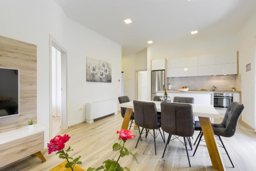 Kuchyňa alebo kuchynka v ubytovaní Apartmani Bosa