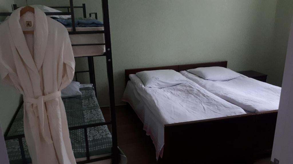 Postel nebo postele na pokoji v ubytování Blue Guesthouse