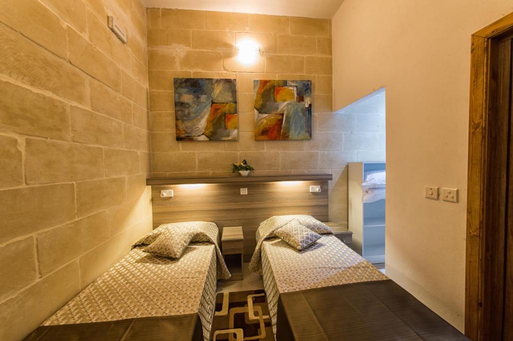 Postel nebo postele na pokoji v ubytování Quayside Apartments