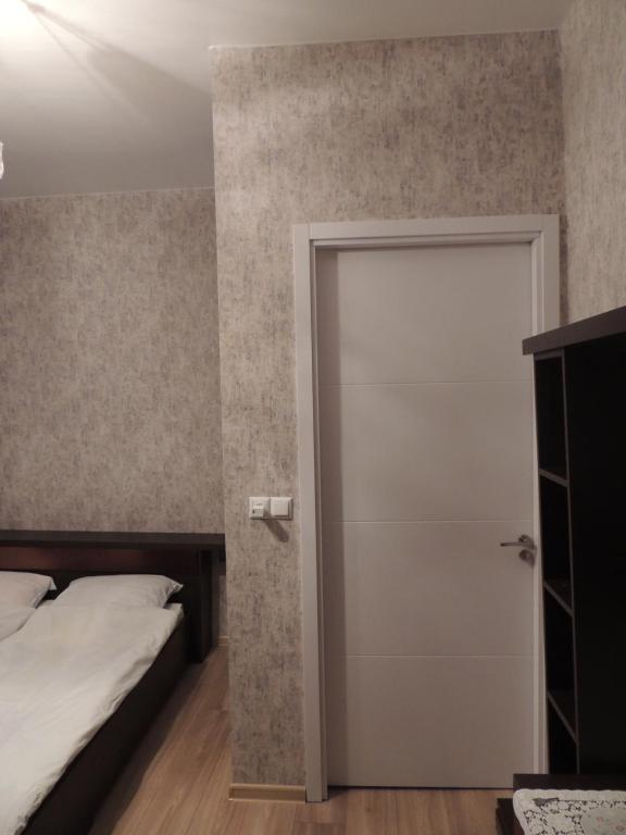 Postel nebo postele na pokoji v ubytování Blue Guesthouse
