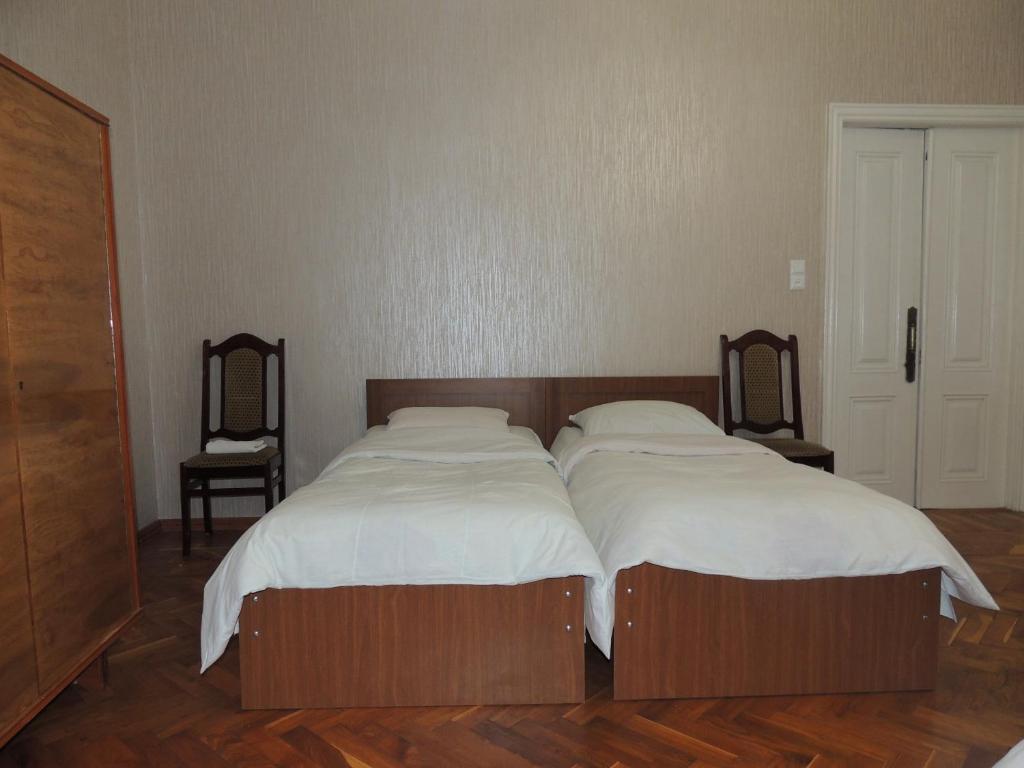 Postel nebo postele na pokoji v ubytování Blue Guesthouse