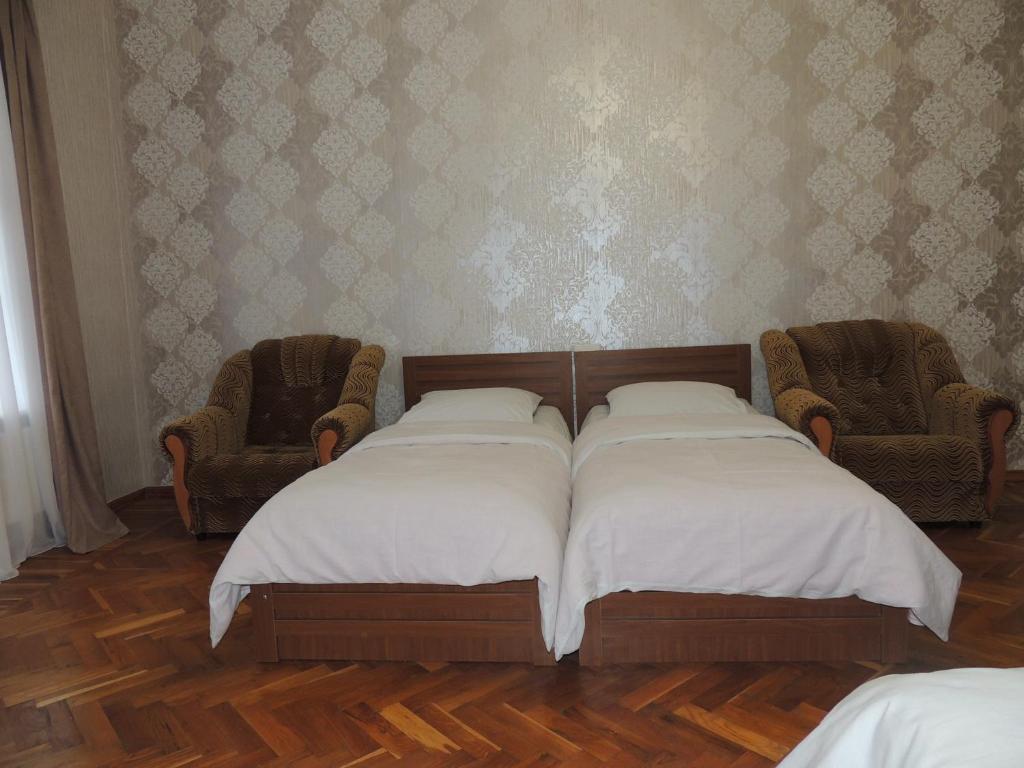 Postel nebo postele na pokoji v ubytování Blue Guesthouse