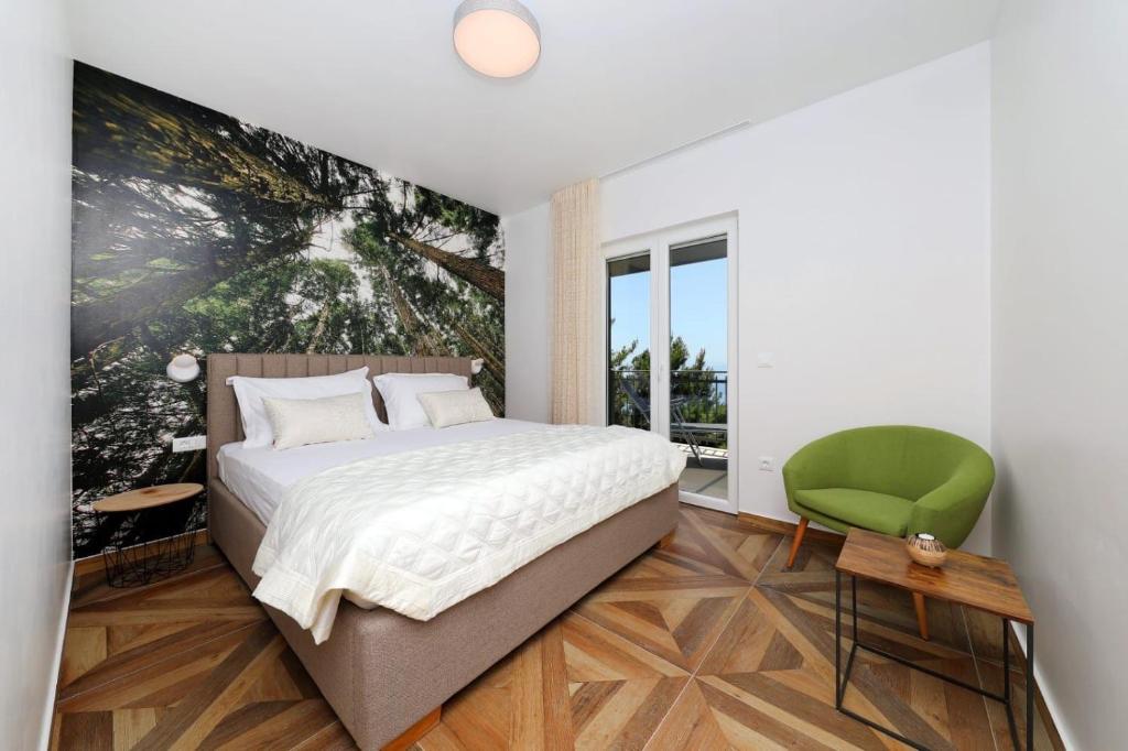 Posteľ alebo postele v izbe v ubytovaní REDSTONE luxury apartments