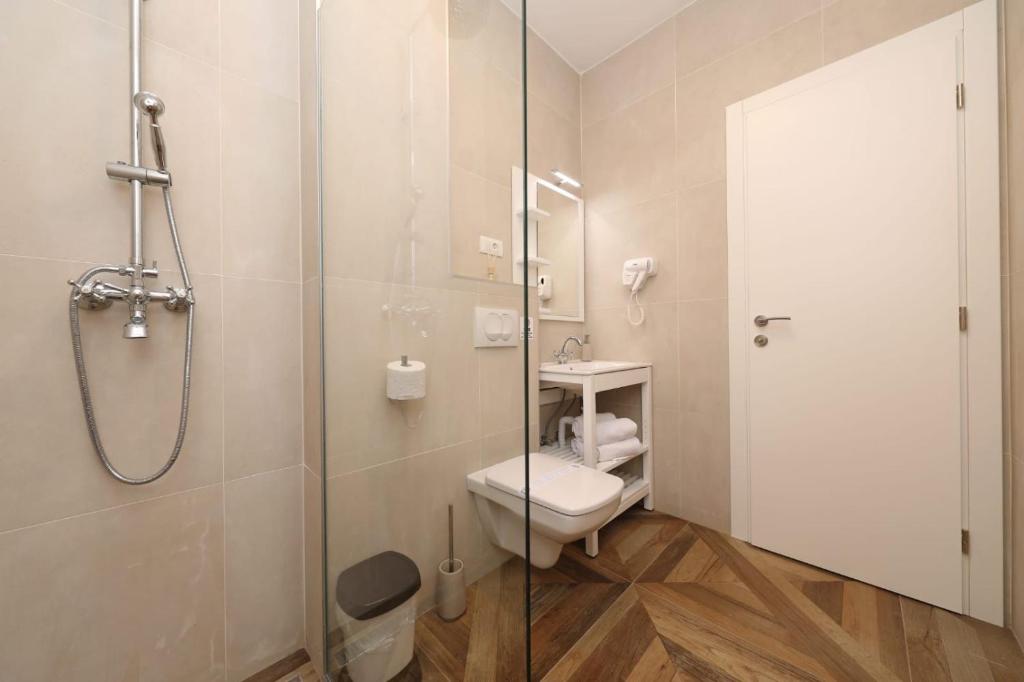 Kúpeľňa v ubytovaní REDSTONE luxury apartments