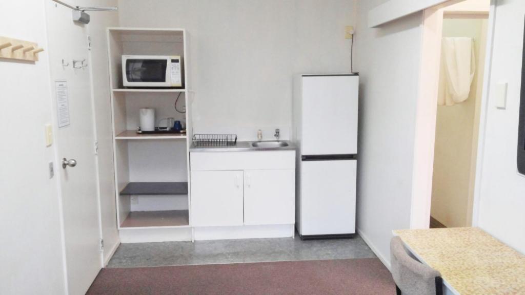 Kuchyň nebo kuchyňský kout v ubytování Backpackers Central Hamilton