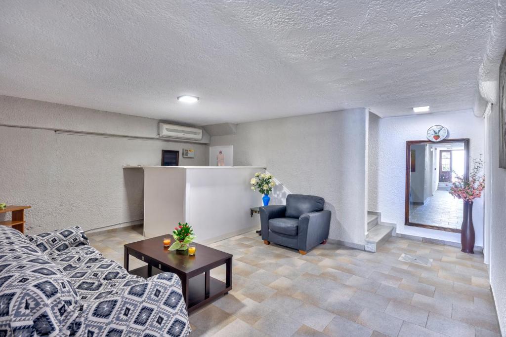 Postel nebo postele na pokoji v ubytování Halaris Rooms