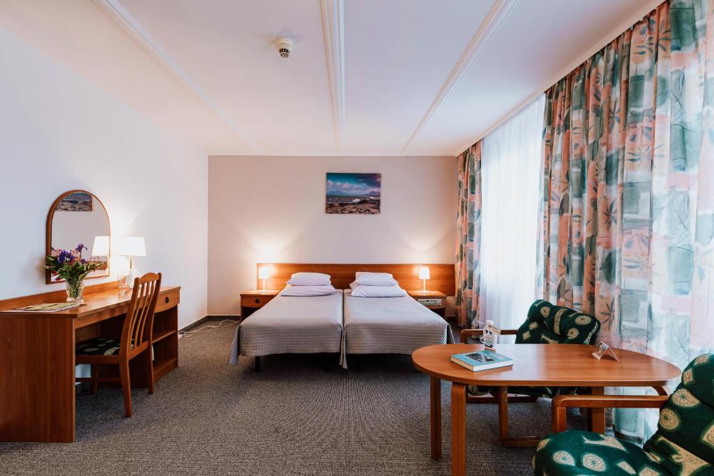 Posteľ alebo postele v izbe v ubytovaní Hotel Gromada Medical SPA Busko Zdrój