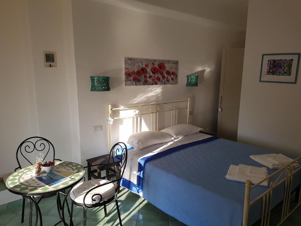 Postel nebo postele na pokoji v ubytování B&B nonnAngela
