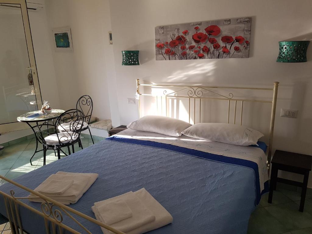 Postel nebo postele na pokoji v ubytování B&B nonnAngela
