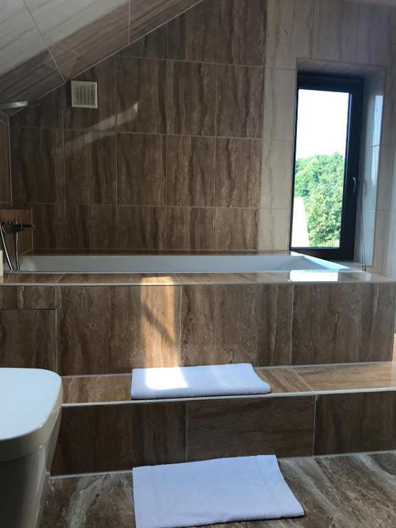 Kúpeľňa v ubytovaní Dom Gościnny Mirabelka